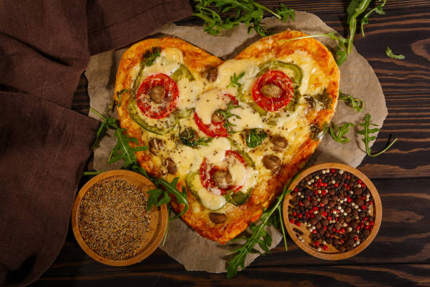 istock Pizza in the shape of a heart 1290910705
