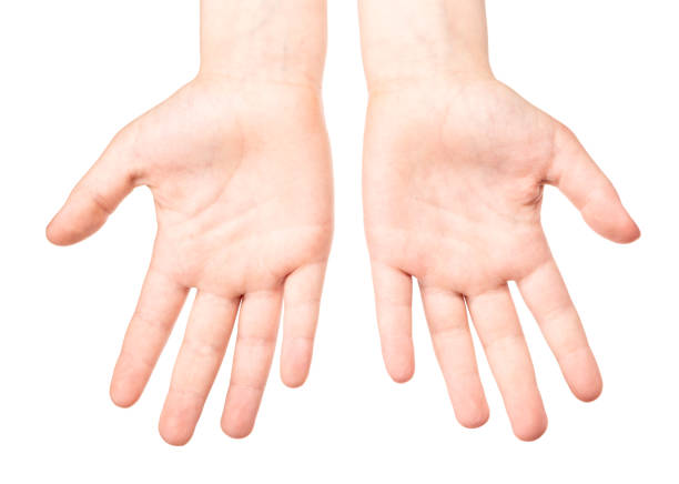Child showing clean hands with palms up to mother after washing isolated on white background - basic protective measures against spreading of coronavirus epidemic concept