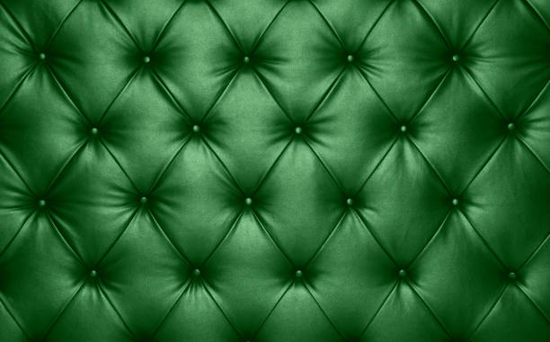 grünes leder capiton hintergrund textur - leather headboard stock-fotos und bilder