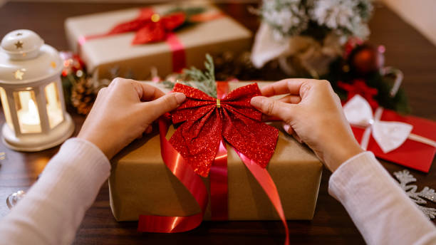 istock Finishing up Christmas gifts 1290915064