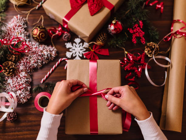 istock Wrapping Christmas gifts 1290915202