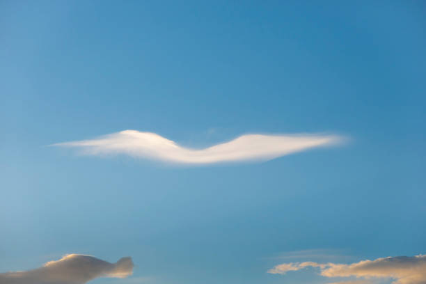 Cloud in sky in shape of moustache for abstract or backgrounds.