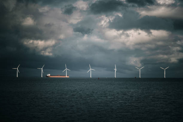 wind turbines in the ocean and coaster - oil tanker tanker oil sea imagens e fotografias de stock