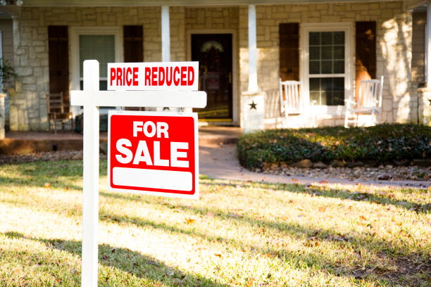 istock Home for sale with real estate sign.  Front yard. 1290924549