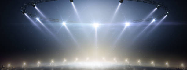 istock Sport background. Blue ice floor texture and mist. 3D rendering. Snow and ice background. 3D empty ice rink illuminated by spotlights. Scene 1290928011