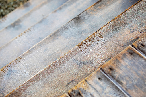 An icy wooden deck mid-winder