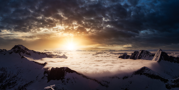Aerial Panoramic View of Remote Canadian Mountain Landscape. Dramatic Colorful Sunrise Art Render. Located near Vancouver, British Columbia, Canada. Nature Panorama Background.
