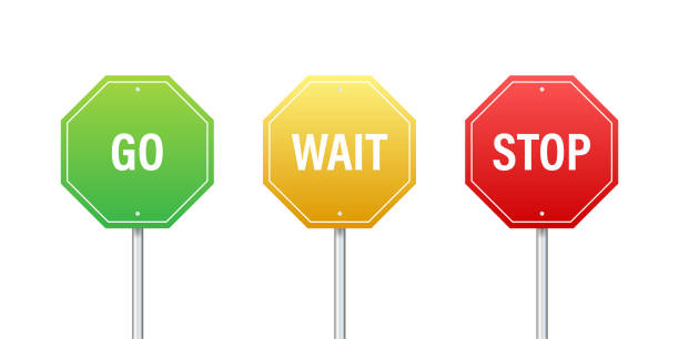 istock Go, wait, and stop traffic signs. Color set. Vector stock illustration 1290942175