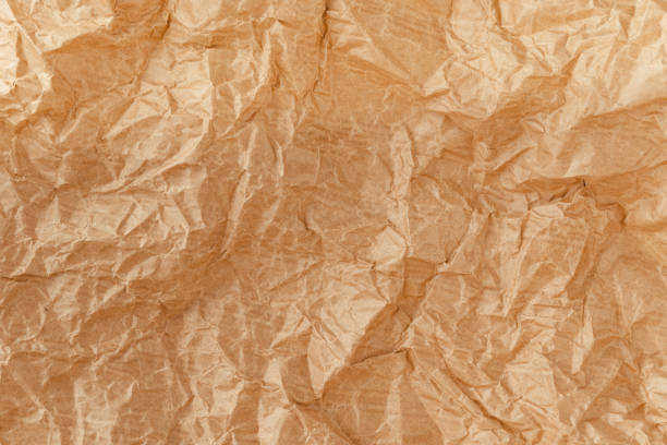 istock Closeup of parchment canvas. Wrapping paper material. 1290942366