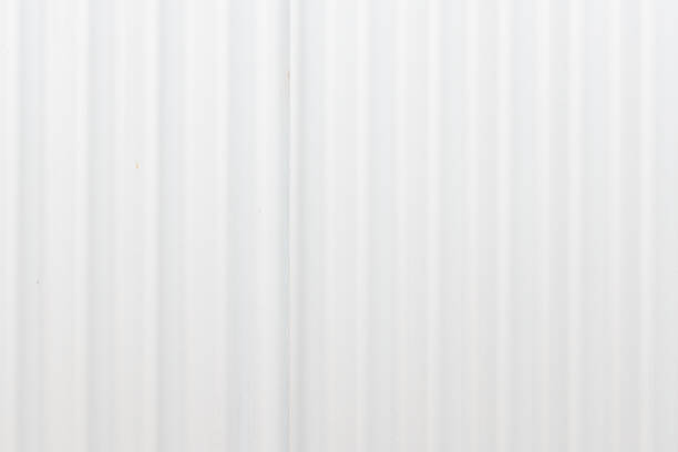 Plain white corrugated fiberglas wall.