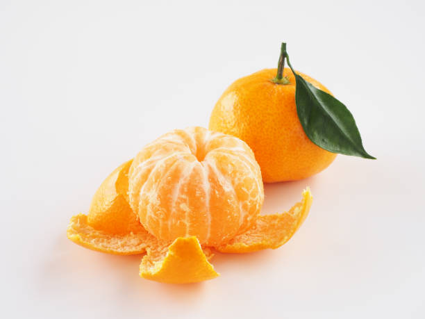 istock Japanese mandarin oranges fruit on white background 1290948554