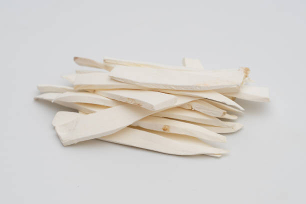 istock shan yao dried chinese yam isolated  on white 1290950822