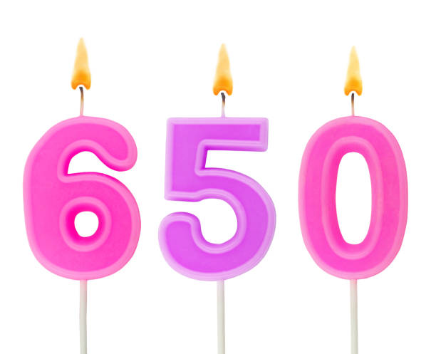 istock Burning birthday candle isolated on white, number 650 1290964116