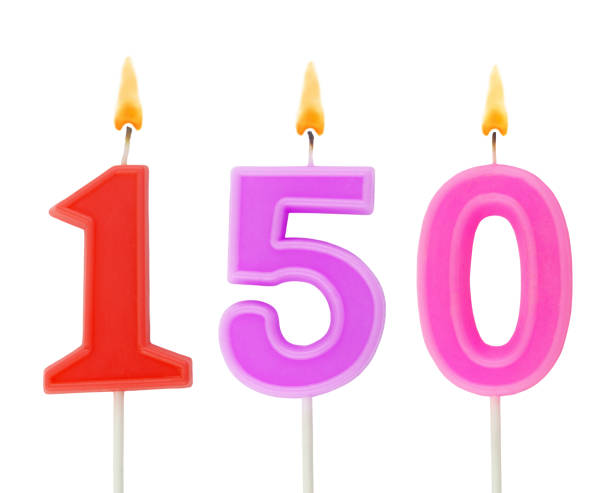 istock Burning birthday candle isolated on white, number 150 1290964130