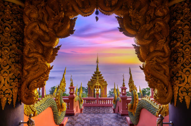 Sunrise with fog at Wat Phra That Doi Phra Chan on the top hill of Doi Phra Chan mountain in Mae Tha, Lampang province, Thailand. Sunrise with fog at Wat Phra That Doi Phra Chan on the top hill of Doi Phra Chan mountain in Mae Tha, Lampang province, Thailand chan buddhism stock pictures, royalty-free photos & images