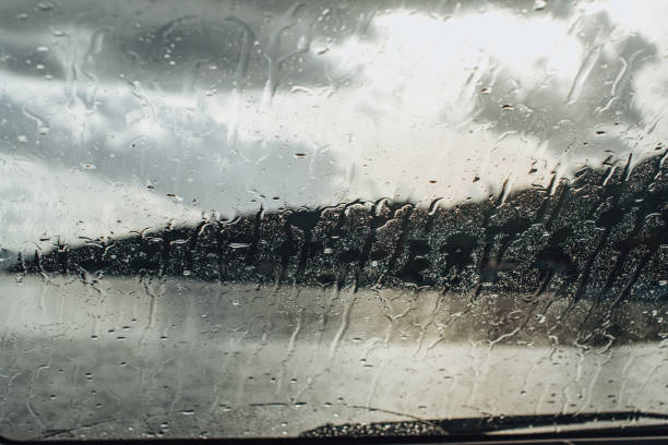 istock Water Drops on the Car Window in the Rain 1290967585