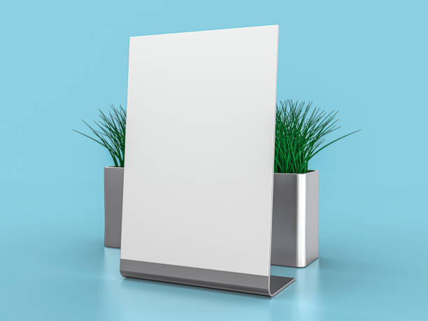 istock Blank paper Table Tent. Mockup on blue background. 3D illustration. 1290969429