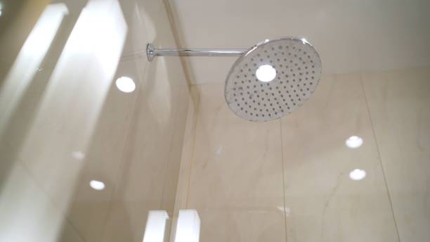 istock A shower from which water pours. streams of water. 1290970479