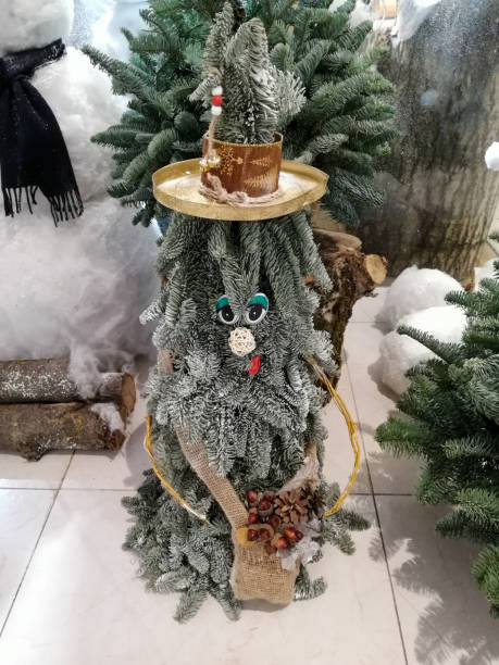 istock New Year's forest stump from a Christmas tree. Fabulous goblin from books 1290974882
