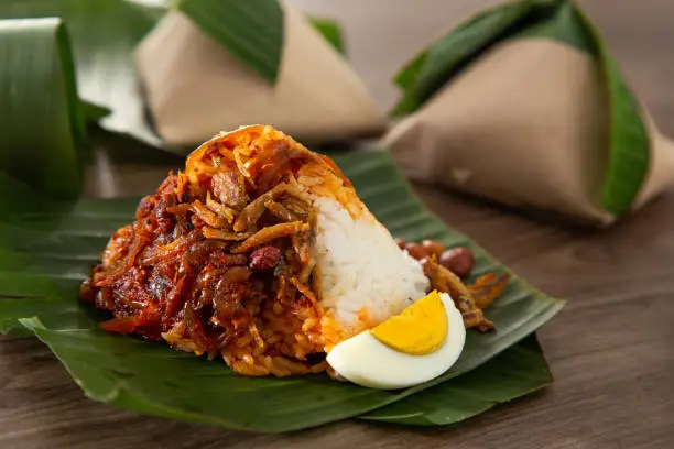 Photo of Nasi lemak pack in banana leaf, popular breakfast in Malaysia