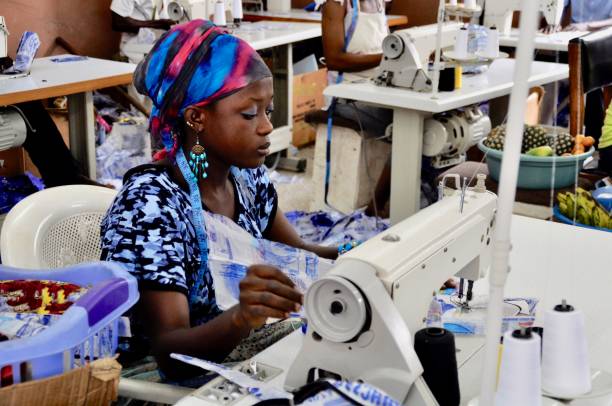 istock Woman Working In Textile Industry 1290975566