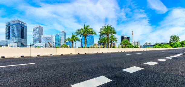 Free Stock Photo of City Street With Tall Buildings and Palm Trees ...