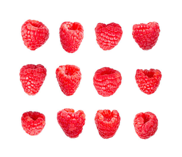 istock ripe raspberries isolated on white background 1290979057