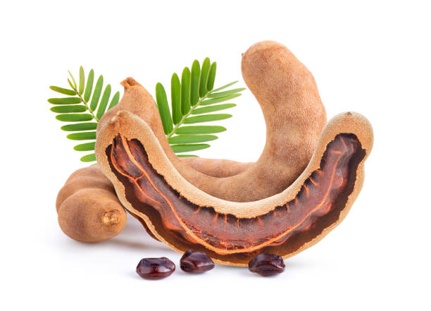 istock tamarind with leaf  isolated on white background . full depth of field 1290980030