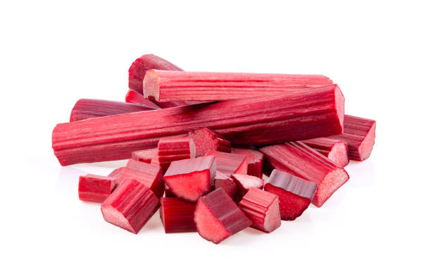 istock Rhubarb stalks on a white background 1290980074