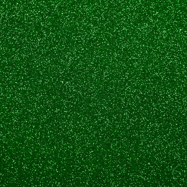 istock Abstract background texture of green glitter 1290980179