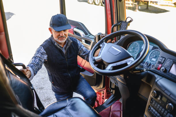 Mature truck driver Mature truck driver preparing to hit the road truck driver stock pictures, royalty-free photos & images