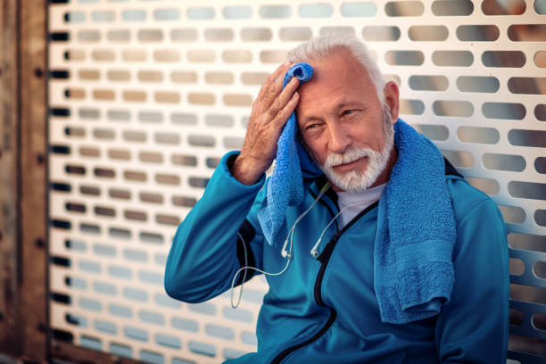 istock Senior man exercising outside in the city 1290985365