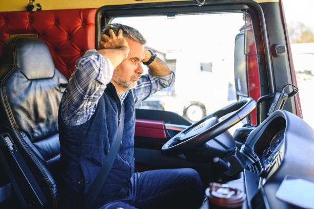 istock Truck driver yelling at someone while driving. 1290989426
