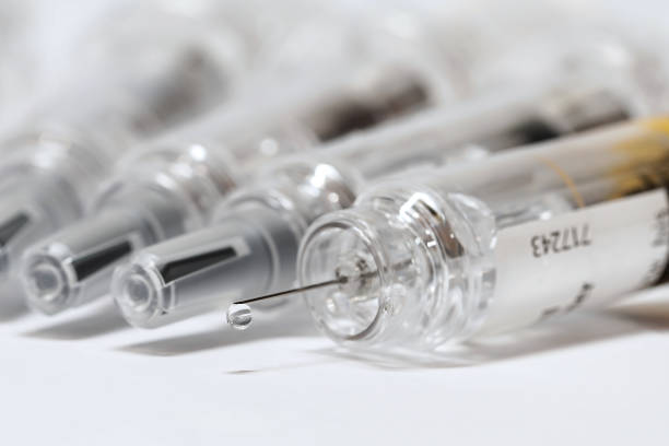 istock Syringe with vaccine to combat coronavirus 1290994017