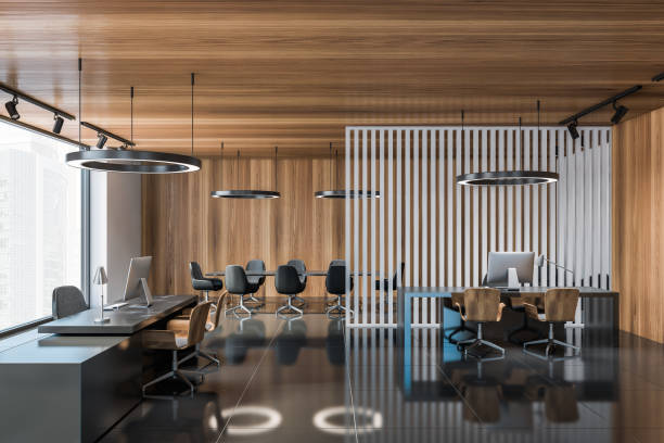 istock Modern gray and wooden open space office 1290994078