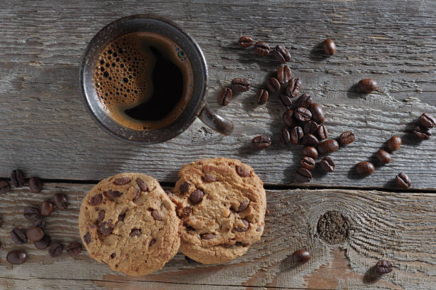istock Cup of coffee and cookies 1290994287