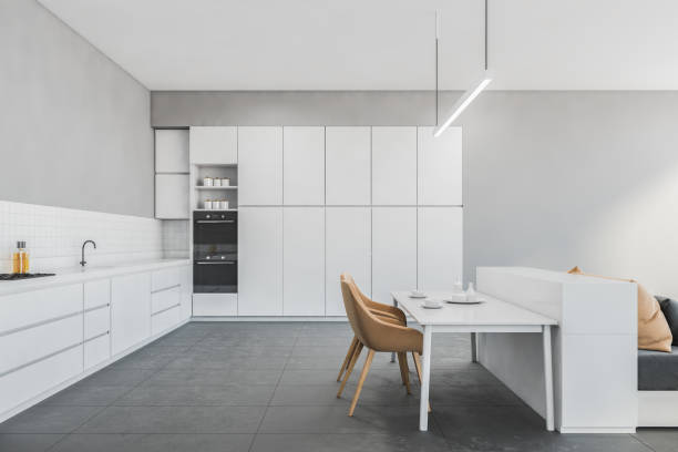 istock Modern living hall room studio with bed and white kitchen zone in a flat 1290994365