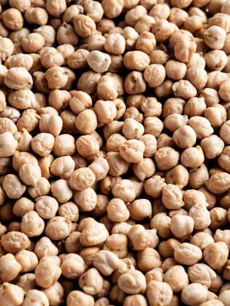 istock Chickpeas, Uncooked chickpeas, Chickpeas in a bowl, Backgrounds, 1290998863