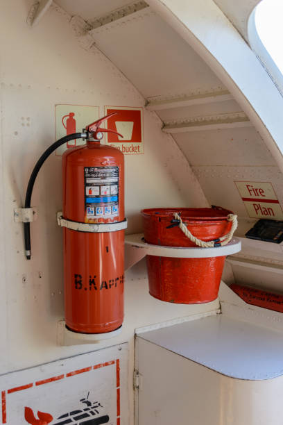 Red plastic water bucket of Japanese traditional fire prevention.