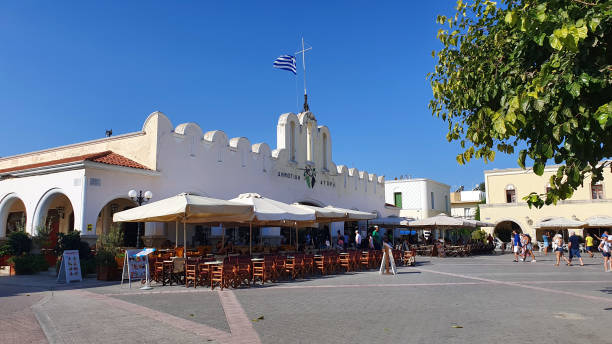 Kos, Greece - September 17, 2019: Market Hall building and Piazza de la liberta in Kos, Greece