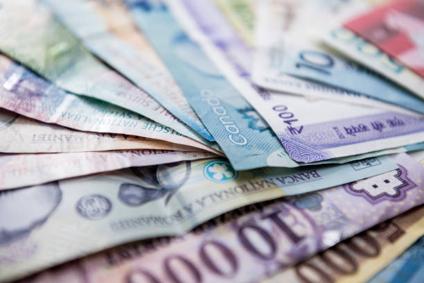 istock Paper money background of the different countries 1291008518