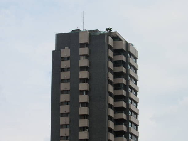istock Facade of an apartment building in a metropolis 1291009199