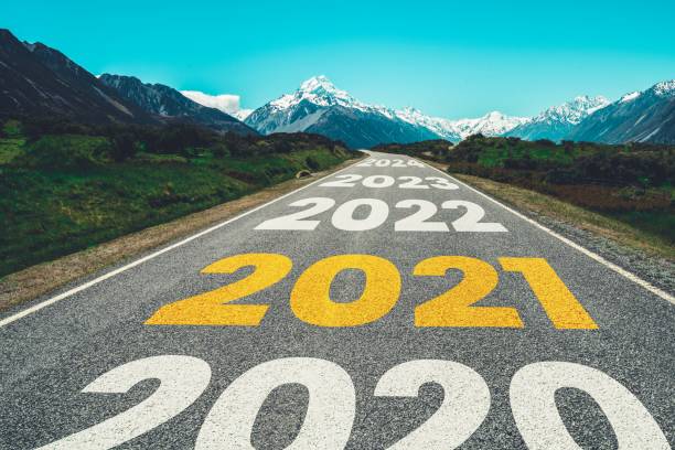 istock 2021 New Year road trip travel and future vision concept . 1291010640