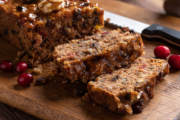 istock Fruitcake Loaf Sliced on a Cutting Board 1291011831