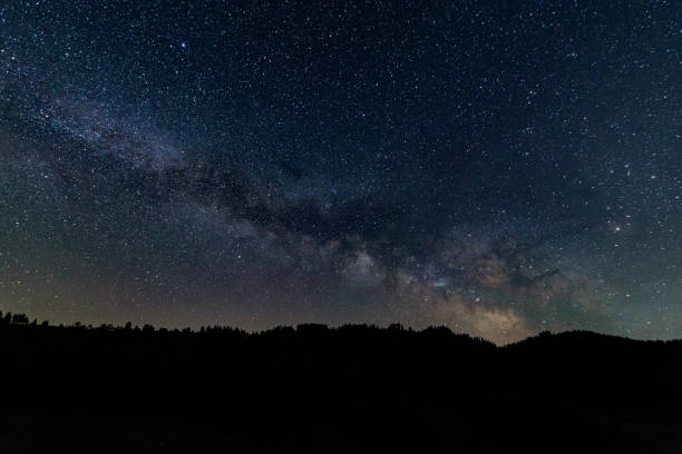 istock Milky way galaxy behind a mountain 1291012377