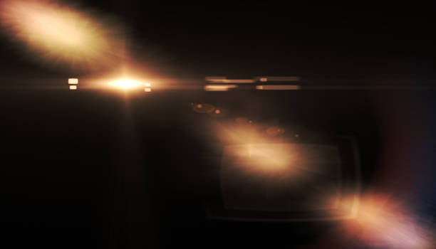 istock Abstract sun flare and bokeh.abstract burst lens flare light over black background 1291012492