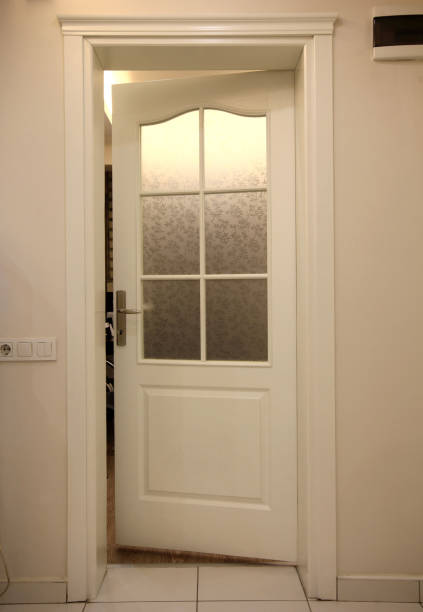 istock New and wooden interior door 1291012542