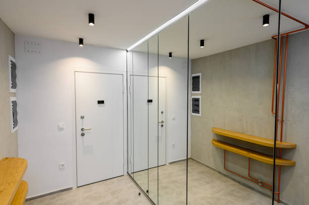 istock Interior of new empty apartment, long home corridor with marble floor 1291013089