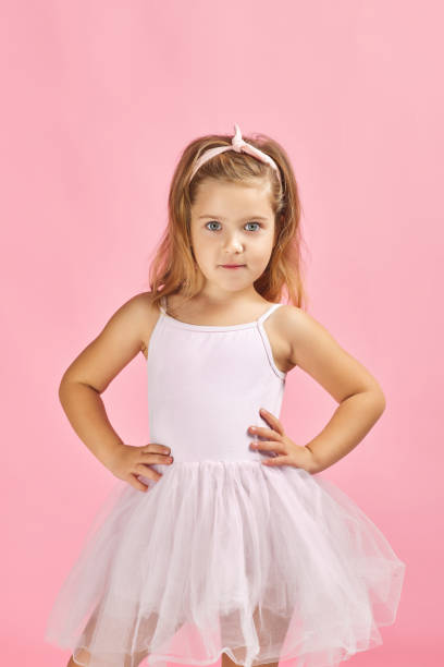 istock little child girl in pink tutu 1291017921