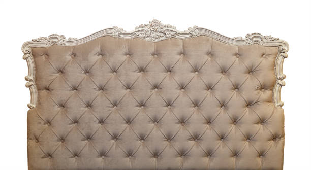 istock Beige velvet bed headboard isolated on white 1291023877